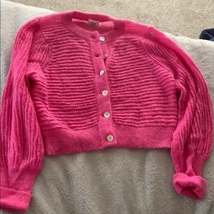 short bright pink cardigan